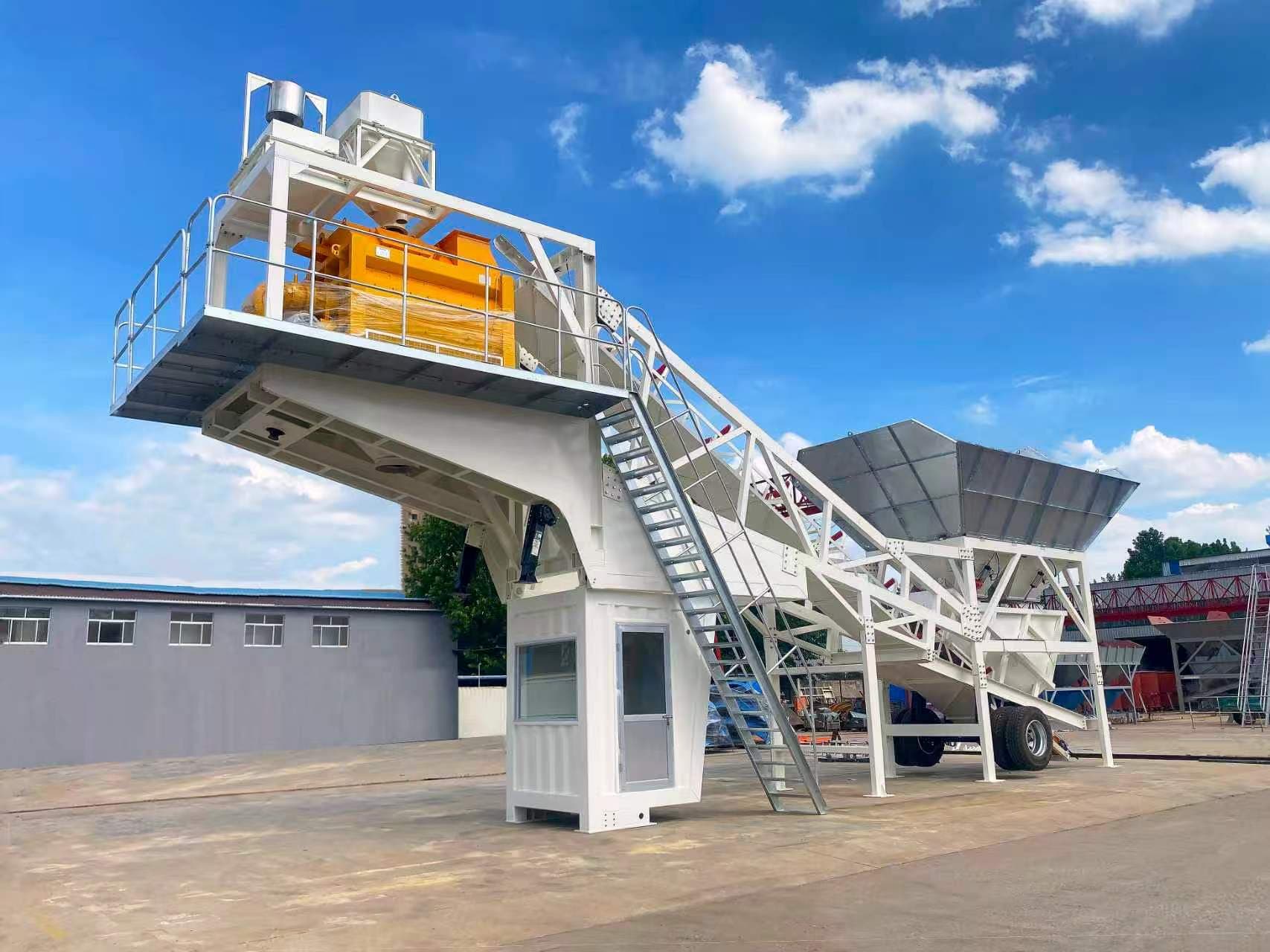 TIANYU mobile batching plant on its road-legal trailer chassis with folding aggregate batcher and mixer platform